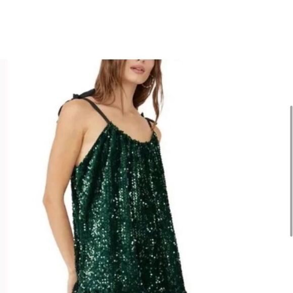 Free People Nova Convertible Sequin Mini
Size L,XS green
NWOT - Picture 3 of 11